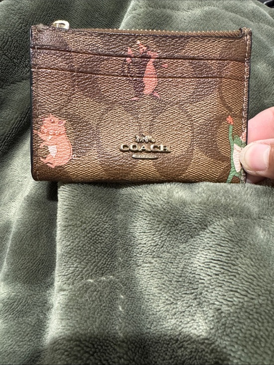 Coach Handbags - Coach Brown Signature Card Case with Pink Cat Motifs